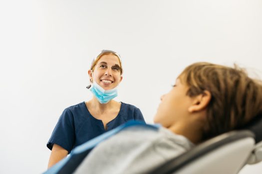 Dentist During A Dental Intervention To a